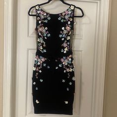 Beautiful Size 2 Jovani Black Cocktail Dress With Intricate Metal Flower Embellishments And Built In Bra. This Dress Is Absolutely Stunning And Worn Only Once. Black Floral Embellished Evening Dress, Flower Embellishments, Metal Flower, Black Cocktail, Black Cocktail Dress, Metal Flowers, Embellishments, Built In, Cocktail Dress