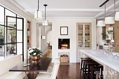 the kitchen is clean and ready to be used as a dining room or living room