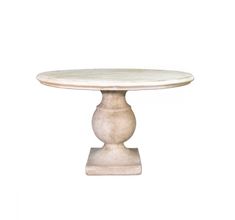 a white marble table with pedestals on the top and bottom, against a white background