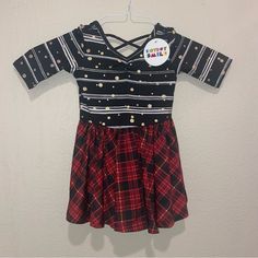 This Gorgeous Dot Dot Smile Dress Comes From The Fancy Collection. It Features A Classic Red Holiday Plaid Skirt And Black Bodice With Gold Accents. This Dress Is Made Of A Super Silky Fabric. Perfect For Special Events, Holiday Gatherings, Christmas, New Years, Etc! Brand: Dot Dot Smile Size: 12-24months Condition: New With Tags This Item Washes And Wears Wonderfully. All Items Ship From My Smoke Free, Pet Loving Home. Black Festive Dress For Fall, Black Christmas Dress For Festive Occasions, Black Dress For Fall Festival, Black Christmas Festive Dress, Cute Black Dress For Playtime, Dot Dot, Holiday Plaid, Silky Fabric, Plaid Skirt