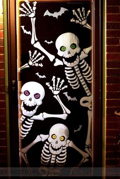 a door decorated with skeletons and bats