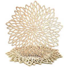 an intricately designed sculpture made out of wooden sticks and plywood strips, on a white background