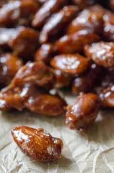 some kind of food that is on a piece of wax paper and next to it are raisins