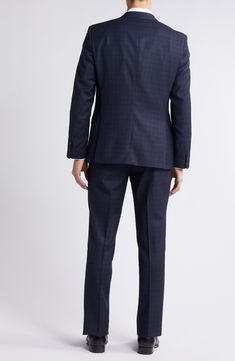 Patterned in a pale plaid, this suit tailored from heathered wool features classic detailing and softer construction for comfort during formal occasions. Jacket has notched lapels; four-button cuffs; chest pocket; welt pockets; side vents Trousers have zip fly with button-tab closure; slant pockets; back button-welt pockets Jacket is partially lined 100% virgin wool Spot clean Made in Turkey Plaid Wool Suits For Formal Occasions, Semi-formal Plaid Suit With Notch Lapel, Classic Plaid Suits For Formal Occasions, Formal Plaid Suits With Notch Lapel, Tailored Plaid Suits With Welt Pockets, Classic Tailored Plaid Three-piece Suit, Plaid Notch Lapel Suit For Formal Occasions, Classic Plaid Three-piece Business Suit, Tailored Plaid Suit For Semi-formal Occasions