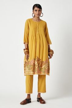 Yellow kurta with floral embroidered motifs on hem, striped pattern and pleated bodice. Comes with pant. - Aza Fashions Festive Straight Kurta Set With Embroidered Hem, Festive Set With Embroidered Hem Straight Kurta, Festive Traditional Kurta With Embroidered Hem, Traditional Sets With Embroidered Hem For Eid, Traditional Eid Sets With Embroidered Hem, Traditional Festive Sets With Embroidered Hem, Festive Cotton Sets With Embroidered Hem, Payal Pratap, Yellow Kurta