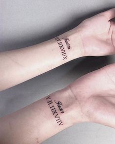 two wrist tattoos with words written on them