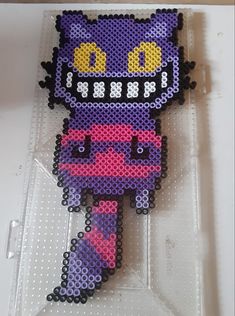 an image of a pixel art piece made out of beads