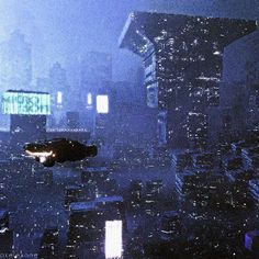 an image of a city at night with skyscrapers in the fog and lights on