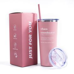 a pink insulated tumbler cup next to a cardboard box with a straw in it