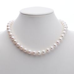 Simple statements of elegance, pearls have been a mainstay in Gump's fine jewelry assortment for decades. Each pearl is carefully selected for quality, color and shape. Composed of lustrous freshwater cultured pearls, this timeless choker is finished with a diamond-studded clasp. White freshwater cultured pearls, 7mm. Diamonds, 0.02ctw. 18-karat yellow gold. 17"L. Classic Pearl Bracelet With Pendant For Formal Occasions, Formal Fine Jewelry Pearl Necklace With Round Beads, Formal Round Beads Pearl Necklace Fine Jewelry, Formal Single Strand Akoya Pearl Necklace, Formal Akoya Pearl Necklace With High Luster, Luxury Pearl White Pearl Necklace For Anniversary, Refined Pearl White Pearl Necklace For Formal Occasions, Refined Pearl Necklace For Formal Occasions, Formal High Luster Akoya Pearl Necklace