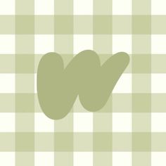 a green checkered table cloth with an image of the letter w