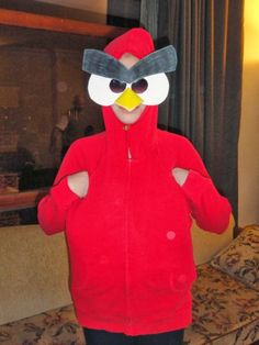 a person in a red angry bird costume