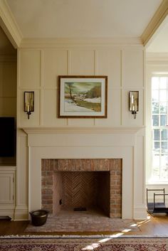 a living room filled with furniture and a fire place