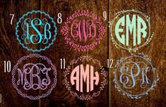 four different monogrammed frames with the initials on them, all in different colors