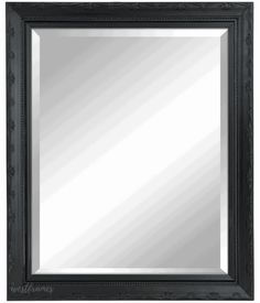 a black framed mirror with an ornate border around the edges and bottom edge, on a white background