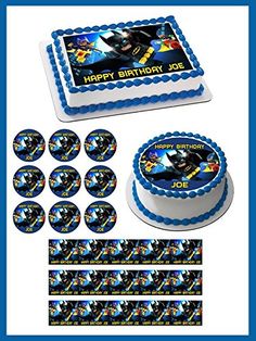 the birthday cake is decorated with blue frosting and edible images for batman's movie theme