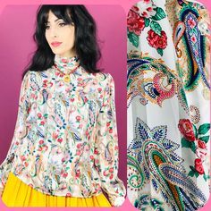 "Vintage 80s white long sleeve high neck blouse with a beautiful paisley and rose pattern Semi Sheer stripes run vertically down the shirt Buttons up the back of the neck Size 8 Measurements are taken flat across front Bust across: 19\" Waist across: 19\" Length of blouse: 23.5\" More vintage clothing and accessories https://www.etsy.com/shop/VenusInVelvetShop?ref=seller-platform-mcnav Find us on Instagram for new items and coupon codes! @venusinvelvetshop" Fitted Long Sleeve Blouse With Paisley Print, Vintage Floral Print Party Blouse, Vintage Long Sleeve Paisley Print Blouse, Vintage Long Sleeve Blouse With Paisley Print, Multicolor Long Sleeve Blouse With Paisley Print, Vintage Long Sleeve Paisley Print Top, Vintage Long Sleeve Top With Paisley Print, Spring Vintage Pattern Fitted Blouse, Vintage Multicolor Paisley Print Tops