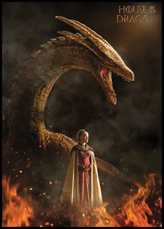 a woman standing in front of a dragon with her hand on her hip and wearing a red cape