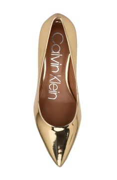 Daring croc embossing adds modern interest to this pointed-toe pump finished with a rubber sole for skid-free stepping. 3'' heel Synthetic upper and lining/rubber sole Imported Women's Shoes Nordstrom Rack, Women's Shoes, Rubber Sole, Calvin Klein, Size 10, Nordstrom, Pumps, Women Shoes, Heels