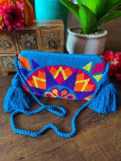 Colombian Crossbody Handmade Tapizada Wayuu Purse. Colorful - Etsy Multicolor Rectangular Bag With Tassels, Multicolor Rectangular Bags With Tassels, Bohemian Crochet Bag With Tassels For Travel, Handmade Blue Shoulder Bag For Festivals, Multicolor Shoulder Bag For Beach Festivals, Blue Rectangular Shoulder Bag For Festivals, Blue Fringed Bags For Vacation, Blue Rectangular Festival Bag, Summer Blue Fringe Bag