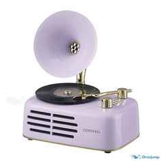 an old fashioned record player with a purple color