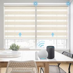 a table with chairs and an amazon smart speaker on it in front of a window