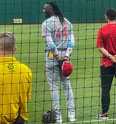 some baseball players are standing on the field