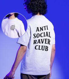 -Gildan 5000 Brand Shirts -Unisex Adult Sizing -Props used in photos are NOT included with purchase Check out this design on other products! Hoodies: https://www.etsy.com/listing/1597855332/anti-social-raver-club-hoodie-rave?click_key=caad6979769db22781b6ddb76a2f6aa3782299e0%3A1597855332&click_sum=78be3d59&ref=shop_home_active_1&frs=1&sts=1 Fiber Composition -Solid colors are 100% cotton; Heather colors are 50% cotton, 50% polyester (Sport Grey is 90% cotton, 10% polyester); Antique colors are 6 Hip Hop Short Sleeve Tops With Logo Print, Cotton Graphic Design Tops For Fan Merchandise, Hip Hop Style Short Sleeve Shirt With Graphic Design, Crew Neck Top With Screen Print For Concerts, Streetwear Cotton Shirt With Back Print, Relaxed Fit Graphic Top For Music Festivals, Cotton Streetwear Shirt With Back Print, Relaxed Fit Top With Graphic Design For Music Festivals, Relaxed Fit Tops With Text Print For Music Festivals