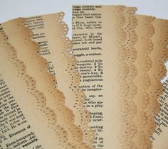 four pieces of paper with lace on them