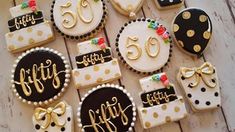 decorated cookies are arranged in the shape of 50th