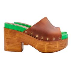 Women's clogs with brown polyurethane base (wood effect) Brown leather upper Green insole 9.5 cm wide heel and 5 cm plateau Lightweight and comfortable Entirely made by specialized Italian personnel Handcrafted using the best materials BEFORE PURCHASING DO NOT FORGET TO CHECK THE SIZE! Brown High Heel Mules With Deep Heel Cup, Green Open Toe Leather Mules, Green Round Toe Platform Mules, Green Open Toe Platform Mules, Green Leather Open Toe Mules, Brown Closed Toe Mules With Deep Heel Cup, Green Open Toe Mules With Leather Sole, Brown Wooden Clogs With Wooden Heel, Brown High Heel Mules With Wooden Heel