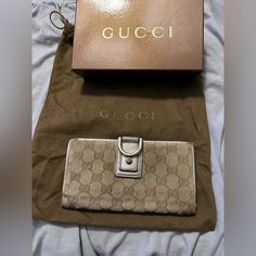 This Is A Gorgeous Gucci Wallet. Metallic Gold. Some Wear On The Sides As Shown But Otherwise Perfection. Comes With Box And Dust Bag. Serial Number As Shown Bags Gucci, Gucci Wallet, Gucci Bags, Metallic Gold, Gucci Bag, Gold Metal, Wallets, Dust Bag, Bag Lady