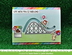 a handmade card with an image of a roller coaster on it, and the words life with you is trailling