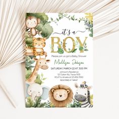 a baby shower with jungle animals and giraffes on it's card