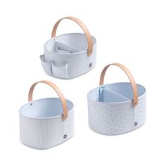 three white and blue baskets with handles