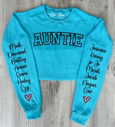 Auntie Heart and Names On Sleeve Sweatshirt, Aunt Sweatshirt Only one text color can be chosen per sweatshirt. Max 10 names per sleeve.  EXAMPLE TEXT ENTRY: Title: Grandma Est 2001 Names: Kelly, Keith, Sheila, Ken, Jack *True to size Unisex adult fit. *50% Cotton 50% Polyester *SEE PHOTOS FOR SIZING CHART Cricut Gifts For Aunt And Uncle, Christmas Gifts For Aunts, Aunt Sweatshirt, Gifts For Aunt, Text Color, Cricut Design, Cool T Shirts, Sweat Shirt, Tshirt Designs