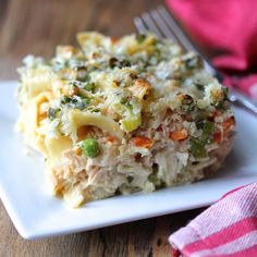 a close up of a plate of food with broccoli and noodles on it