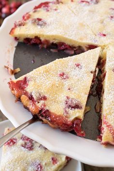 there is a pie that has been cut into pieces and served on a plate with a fork