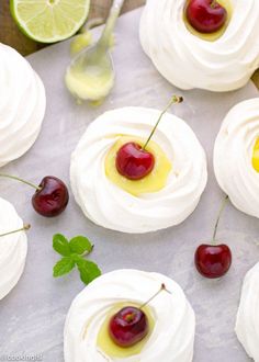 small desserts with cherries and whipped cream