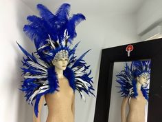 We make and ship our items really fast if you need it for a specific date please let us know. or call/text us at 954-3051817 to complete your order over the phone Blue and Silver Cocktail feather collar with nandu feathers Ostrich feather headdress with cocktail feathers and a Silver Sequin and crystal crown Glitter elastic harness very light and easy to wear The silver cocktail feathers have a black background Therefore some black color is seen on them Gold cocktail is also available to replace Blue Costume Hat For Carnival, Blue Costume Hats And Headpieces For Carnival, Elastic Harness, Feather Collar, Silver Cocktail, Feather Headdress, Azul Real, Ostrich Feather, Gold Cocktail