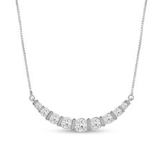 Layer charming sparkle into your favorite looks with this lab-created diamond nine-stone necklace. 14K white gold Nine channel-set round certified lab-created diamonds graduate in size to the largest 1/4 ct. center stone This curved design suspends centered along a box chain F color/SI2 clarity with certification card 1 ct. t.w. of lab-created diamonds 16.0- to 18.0-inch adjustable necklace; spring-ring clasp Diamond White Channel Set Necklace, Fine Jewelry Diamond White Channel Set Necklace, White Gold Channel Set Lab Grown Diamond Jewelry, Round White Gold Channel Set Necklace, Fine Jewelry White Necklace Channel Set, White Channel Set Fine Jewelry Necklace, Diamond White Channel Set Diamond Necklace, Channel Set Round Diamond Necklace, Channel Set Diamond Round Necklace