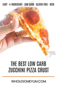 the best low carb zucchini pizza crust is in someone's hand