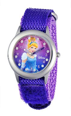 DISNEY Disney Cinderella Kids Time Teacher Glitz Purple Nylon Fast Strap Watch. Learning to tell time has never been easier than with this watch adorned with a darling silhouette of Cinderella. cute disney accessories | disney cinderella | disney watch #disney #disneyworld #disneyland Jewelry Questions, Disney Princess Cinderella, Jewelry Advice, Princess Cinderella, Crystal Watches, Us Government