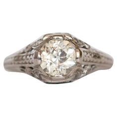 Ring Size: 5.75 Metal Type: Platinum [Hallmarked, and Tested] Weight: 2.5 grams Center Diamond Details: GIA REPORT # 6204963958 Weight: 1.07 carat Cut: Old European Brilliant Color: K Clarity: SI1 Side Diamond Details: Weight: .06 carat Cut: Transitional Round Color: G Clarity: VS Finger to Top of Stone Measurement: 5mm Condition: Excellent 1920s Engagement Ring Vintage, 1950s Engagement Ring, 1920s Engagement Ring, Yellow Diamonds Engagement, Edwardian Engagement Ring, Solitaire Ring Set, Engagement Ring Art Deco, Platinum Engagement Ring, Platinum Diamond Engagement Rings