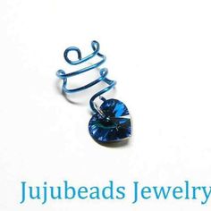 Handmade To Order No Piercing Required 10mm Swarovski Crystal Ear Cuff In Bermuda Blue Wire Swirl Ear Cuff Varies In Size/Fit Per Person Adjustable Blue Ear Cuff For Gifts, Heart Ear Cuff, Crystal Ear Cuff, Cuff Earring, Moon Studs, Crystal Dangle Earrings, Ear Cuff Earings, Gem Necklace, Sterling Silver Dangle Earrings