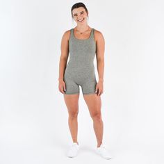 Make sure your wardrobe is complete with this bodysuit, designed in the perfect shade of Heather Granite Gray. This must-have neutral goes with any look, so you can be ready for any adventure life throws your way! 5" inseam Fully lined Straight straps with no binding (seamless straps) “On the go” style Cut out back detail No front seam Reflective FLEO logo on back Sydney is 5'6" and a 34A wearing size S Gray High Stretch Bodysuit In Athleisure Style, Gray High Stretch Bodysuit For Athleisure, Sleeveless Stretch Gray Bodysuit, Gray Stretch Sleeveless Bodysuit, Gray Stretch Bodysuit For Yoga, Fitted Seamless Gray Bodysuit, Fitted Gray Seamless Bodysuit, Fitted Gray Sleeveless Bodysuit, Fitted Sleeveless Gray Bodysuit