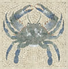 a crab made out of blue and white tiles