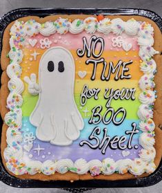 there is a cake decorated to look like a ghost with the words no time for your boo