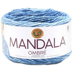 a blue ball of yarn with the words mandala written in spanish on it