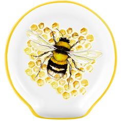 a yellow and white plate with a drawing of a bee on it's side